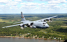 A C-130H of the 133rd Airlift Wing flying along the shore of Mille Lacs Lake in northern Minnesota during a training mission C-130H over Mills Lacs Lake - 060820-F-3188G-124.jpg