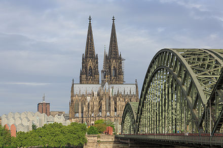 The Dom (cathedral) and Hochenzollernbrücke (railway bridge) are two of the most recognizable landmarks of Cologne