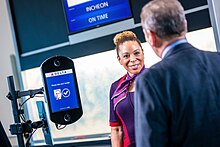 Facial recognition software at a US airport Customer cleared to board flight (46092017161).jpg