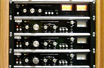 Professional audio signal processors by dbx, Inc., based on the Blackmer gain cell. Dbx, founded and owned by Blackmer, was the first company to commercialize his inventions Dbx, Inc. audio compressors on a rack (cropped).jpg