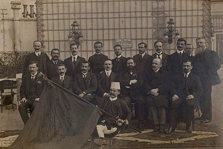 The main delegates of the Albanian Congress of Trieste with their national flag, 1913.