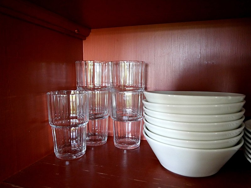 File:Drinking glasses and plates in kitchen cupboard 20170903.jpg