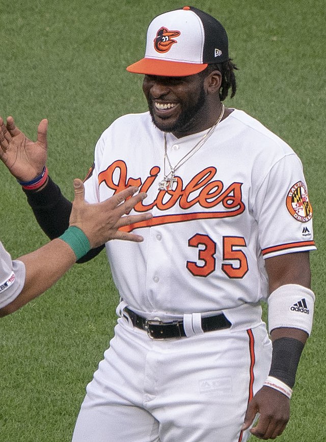 Baltimore Orioles' Dwight Smith Jr., right, is congratulated by