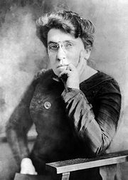 Emma Goldman, pioneer anarcha-feminist author and activist. Emma Goldman seated.jpg