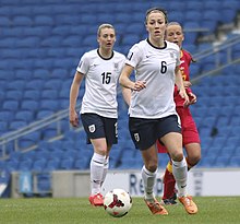 Bronze (foreground; number 6) playing against Montenegro in 2014 England Ladies v Montenegro 5 4 2014 826.jpg