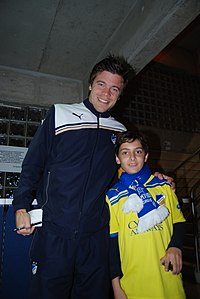 Esteban Solari with APOEL fan.jpg