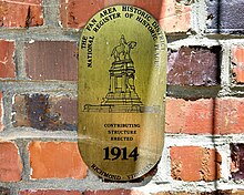 A plaque noting when a building in the Fan was built as part of the National Register of Historic Places. FanHistoricalRVA sign 1914.jpg