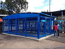 A Parkiteer bicycle parking station at Sunshine railway station, Melbourne in Australia Former Sunshine Parkiteer bike cage.jpg