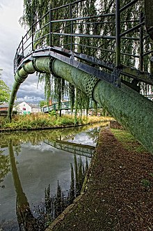 The main pipeline from Elkesley to Lincoln is self-supporting where it crosses the Foss Dyke Navigation at Saxilby. Fossdyke Navigation, Saxilby (geograph 4632809).jpg