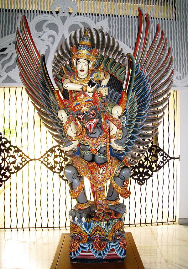 Balinese wooden statue of Vishnu riding Garuda, Purna Bhakti Pertiwi Museum, Jakarta, Indonesia.