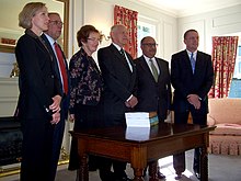 The Royal Commission presented its report to the Governor-General on 25 March 2009. From left: Heather Harris (commission executive officer), David Shand (commissioner), Dame Margaret Bazley (commissioner), Hon Peter Salmon QC (chairperson), Hon Anand Satyanand (governor-general), and Brendan Boyle (Secretary of Internal Affairs) Gg-royal-commission-on-auckland-governance-2009-events-altogether.jpg