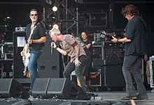 Jeff Gutt (center) with Stone Temple Pilots at Hellfest 2019.