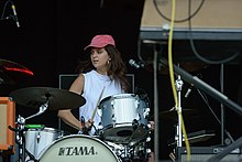 Jones drumming with Hot Chip at Lollapalooza 2015