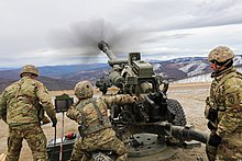 Soldiers train on the M119 howitzer in Yukon Training Area in 2021 Howitzer practice (51257089543).jpg