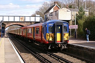 <span class="mw-page-title-main">Effingham Junction railway station</span> Railway station in Surrey, England