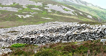 Inside the Celtic Iron Age hillfort of Tre'r Ceiri, Gwynedd Wales, with 150 houses; finest in N Europe 27.jpg