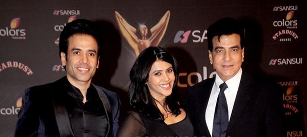 Ekta Kapoor (center) with younger brother Tusshar (left) and father Jeetendra (right)
