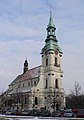 * Nomination St. Joseph Church in Kalisz --ToSter 09:12, 24 December 2009 (UTC) * Promotion  Comment I'd like to see the corner of the house on right being cropped away or the perspective to be corrected. --MattiPaavola 17:58, 25 December 2009 (UTC) Cropped. --ToSter 19:49, 25 December 2009 (UTC) ok for me. --MattiPaavola 01:00, 26 December 2009 (UTC)