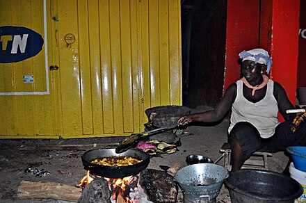Preparation of kelewele, fried and seasoned plantain, a popular Ghanan street snack