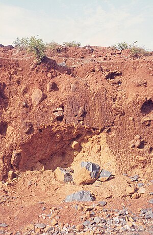 Laterite with relics of unweathered basalt. Pu...