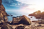 Miniatuur voor Bestand:Little Corona Beach sunrise (Unsplash).jpg