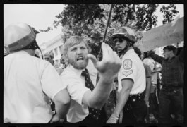 Man heckles iranians demonstrating for khomeini.tif