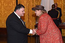 HE Marie Louise Coleiro Preca, President of the Republic of Malta, appointing Immanuel Mifsud Member of the Order of Merit, 13 December 2014 MemberOrderofMerit2014.jpg