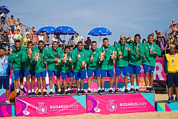 The Brazil team at the medals ceremony of the 2019 South American Beach Games.