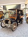 Mors Typ N Tonneau von 1910 in der Cité de l’Automobile – geschlossener Wagen mit Passagiereinstieg im Heck