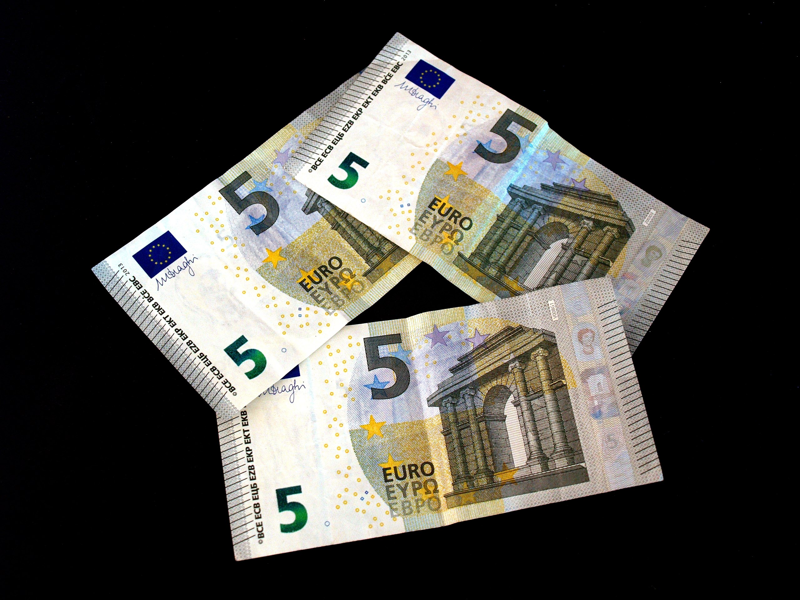 Premium Photo  Fragment of five euro bill 5 euro banknote the