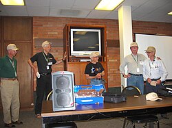 Skeptical Toolbox regular Ben Baumgartner (far right) presents the faculty with Skeptic Toolbox hats. From left Wallace Sampson, James Alcock, Ray Hyman and Barry Beyerstein. (August 2005) Our leaders.jpg