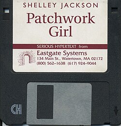 Photo of a floppy diskette labelled Shelley Jackson Patchwork Girl.jpg