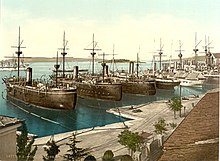 Kaiser Max (left), Prinz Eugen (center), and Don Juan d'Austria (right) in Pola Pula naval yard.jpg