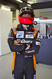 Roman Rusinov (pictured in 2013) contributed to the No. 26 G-Drive Racing Ligier's win by a lap from the sister No. 28 car. Roman Rusinov Driver of G-Drive Racing's Oreca 03 Nissan (8667626565).jpg