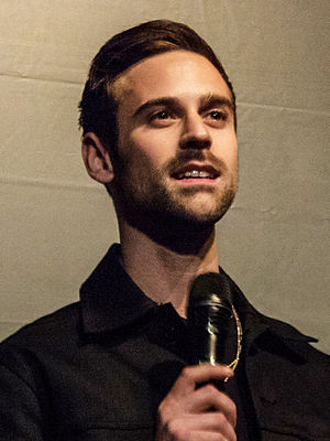Lewis performing with Macklemore in April 2013