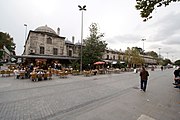 The Evvel Medrese, as seen from the market street on its east side. The domed chamber on the left corner is part of the mekteb (primary school).