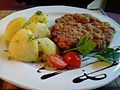 Breaded pork cutlet (kotlet schabowy) with boiled potatoes