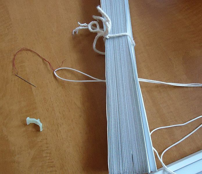 File:Shades restringing project needle and thread pulls cord through holes.jpg