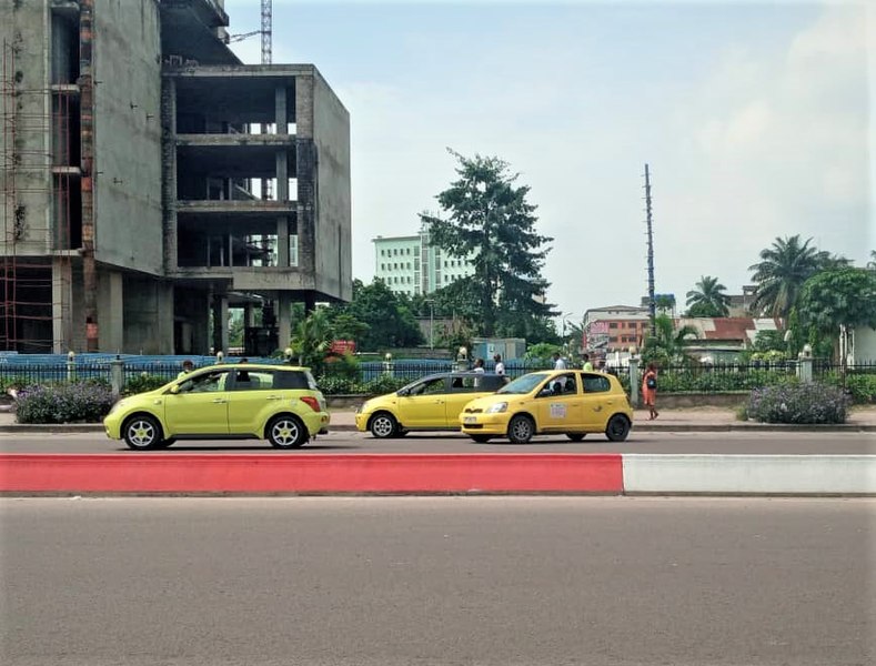 File:Taxi Stand by the Bustand- 1 at Kinshasa, DRC.jpg