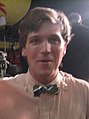 Tucker Carlson, presently a host on the Fox News Channel, wearing a bow tie in early 2004.