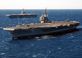 USS John F. Kennedy (CV-67) with USS Theodore Roosevelt (CVN-71).jpg