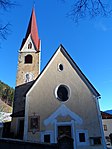 Pfarrkirche St. Wolfgang mit Friedhofskapelle und Friedhof in Schalders