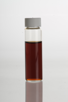 Vanilla extract in a clear glass vial VanillaExtract.png