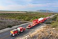 Ballast Tractor Pushing Goldhofer hydraulic modular trailer with Faktor 5 girder bridge.