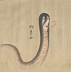 7 Nure-onna (ぬれ女) "wet woman" (alternate name Nure-yomejo) looks like a reptile with a snake-like body and a woman's head. Nure-onna tends to be a combination of sea serpent and vampire. She roams open waters such as oceans, rivers, and lakes, searching for her prey: humans and their blood. She is found in the regions of Kyūshū, Niigata and Fukushima.[24] It is said that Nure-onna is married to or closely associated with Ushi-oni, and they work together as a team. Nure-onna hands her baby off to innocent strangers, then walks into the sea and disappears. The baby becomes incredibly heavy so that the victim cannot move. Ushi-oni then comes out of the water to attack and they feed on the prey together.[25]