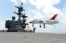 A VT-21 T-45C Goshawk prepares to land on the aircraft carrier USS George H.W. Bush (CVN 77) April 24, 2013 A U.S. Navy T-45C Goshawk aircraft assigned to Training Squadron (VT) 21 prepares to land on the flight deck of the aircraft carrier USS George H.W. Bush (CVN 77) April 24, 2013, in the Atlantic Ocean 130424-N-FU443-625.jpg