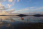 Thumbnail for File:A boat rests unused near the Acheloos river delta.jpg