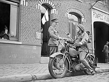 A despatch rider delivers a message to the signals office of 1st Border Regiment at Orchies, France, 13 October 1939 A motorcycle despatch rider delivers a message to the signals office of 1st Border Regiment at Orchies, France, 13 October 1939. O129.jpg
