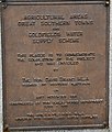 Agricultural areas extension plaque below statue of C.Y. O'Connor.jpg