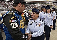Stremme shaking hands with a member of the Air National Guard at Bristol in 2010, his sponsor that year. Air Guard recruiters reach lifetime achievements 100321-F-5495S-136.jpg